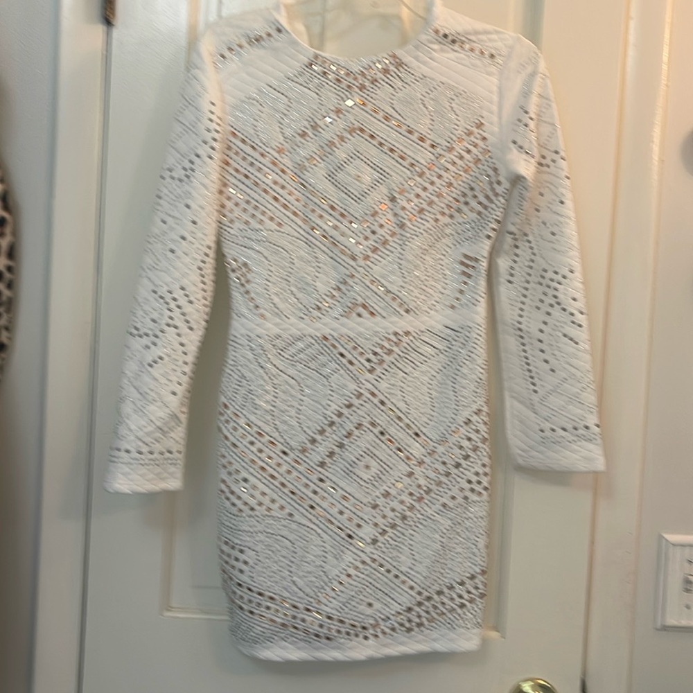 Small embellished dress never worn still with tags a beautiful piece
